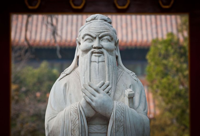 statue of Confucius in Temple of Confucius in Beijing, China Rencontre inédite entre dirigeants chrétiens et confucéens
