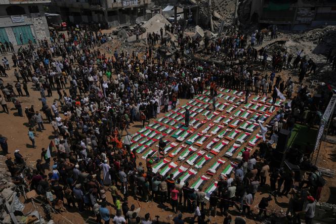 b30c1029-5a99-4879-8dbd-5529ad61fb49 Funérailles Collectives à Gaza: Un Deuil Sous Les Décombres