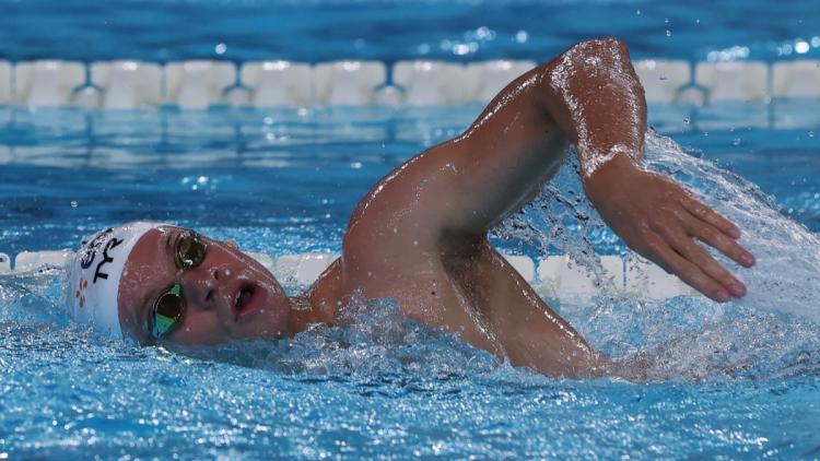 faf21a0b-4a62-48c7-ae93-2d171cb3151d Léon Marchand Triomphe au 400 m Nage Libre