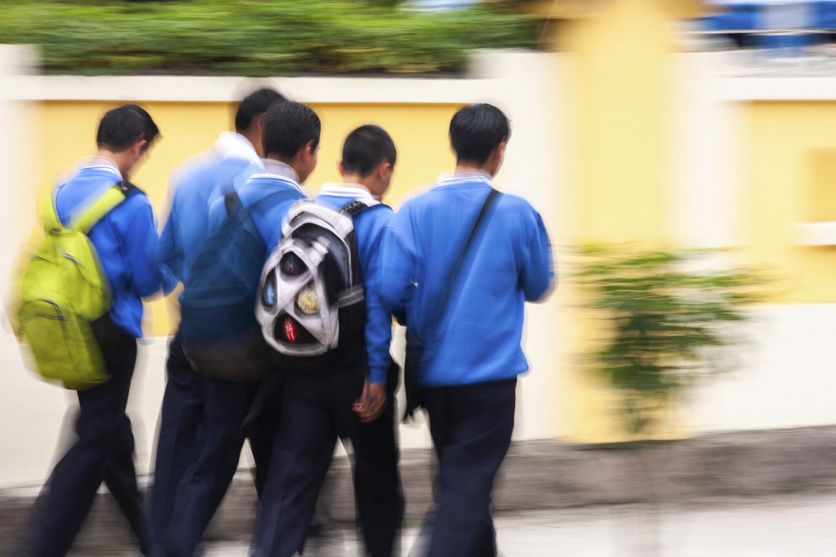 Students going to school, Photo with motion blur, City of Quito, Pichincha province, Ecuador, South America La rentrée scolaire sous haute surveillance à Quito